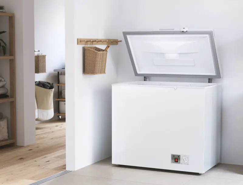 Bosch chest freezer open in a home utility area